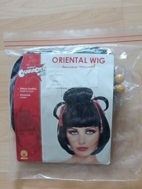 Rubie's Black Oriental  Wig with Bun and Bangs